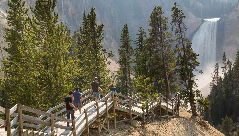 Photo of people climbing the final steps down to Red Rock Point